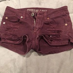 Maroon ripped shorts